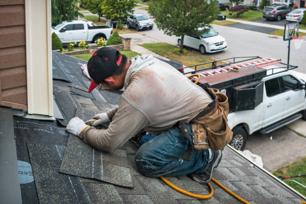 Professional Roofing technician working in Leverett, MA